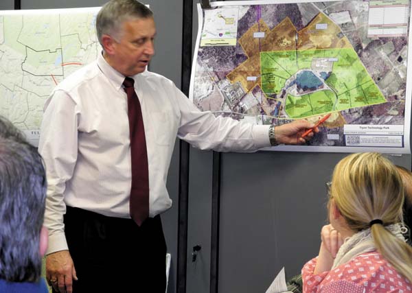 Fulton County Industrial Development Agency Executive Director James Mraz reviews a solar array project at the Tryon Technology Park at the IDA board of directors meeting Thursday at the Fort Johnstown Annex in Johnstown.(The Leader-Herald/Michael Anich)