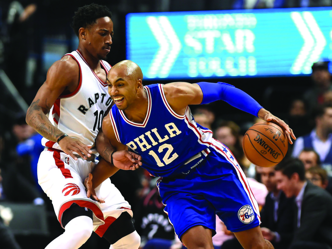 Toronto Raptors guard DeMar DeRozan (10) defends against Philadelphia 76ers guard Gerald Henderson (12) during first-half NBA basketball game action in Toronto, Monday, Nov. 28, 2016. (Nathan Denette/The Canadian Press via AP)