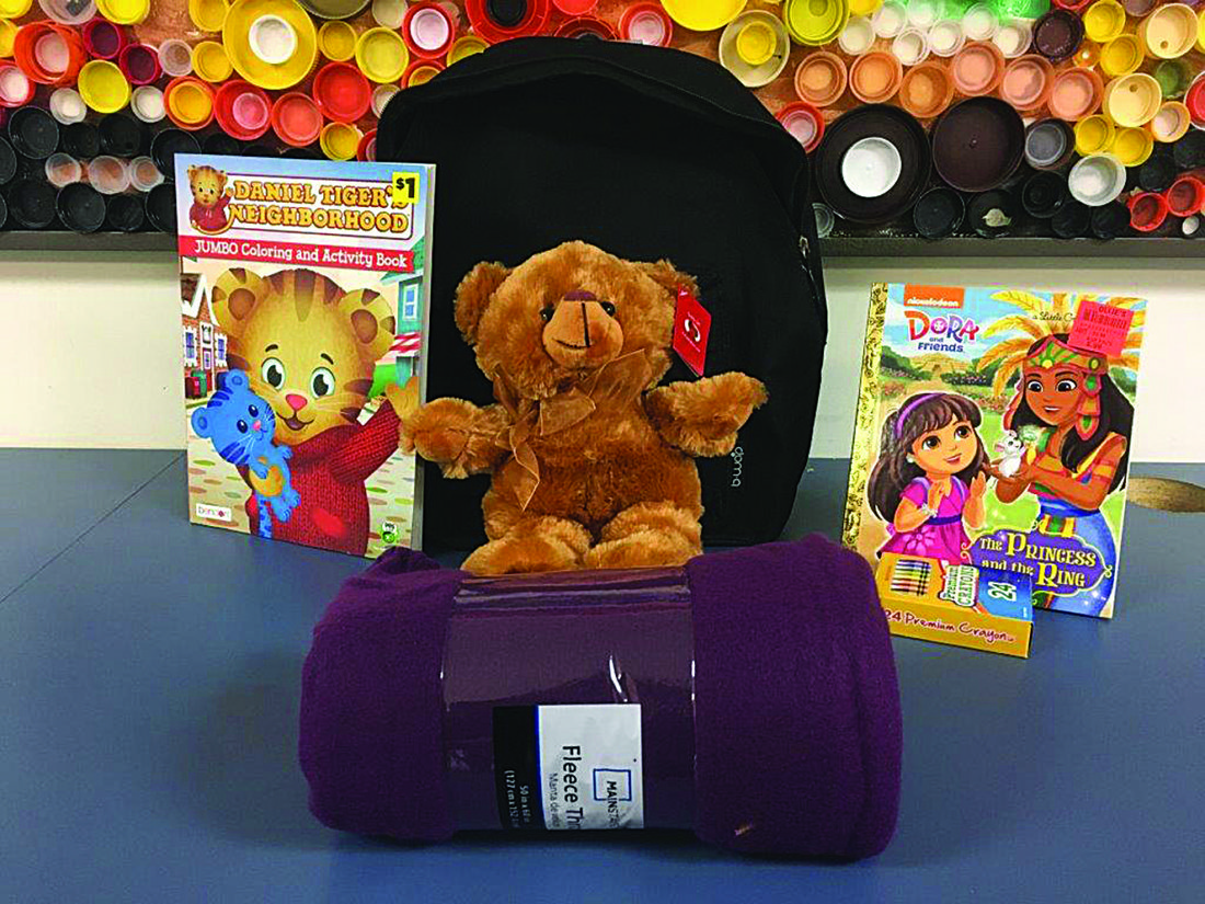 PHOTO PROVIDED BY MEL CURTIS
Each buddy pack includes a variety of comforting items, including a coloring book, crayons, age-appropriate book to read, fleece blanket, and a small, cuddly stuffed animal. Donations are welcome, whether they be monetary or items for the packs, including brand new, Beanie Baby-sized stuffed toys and specific titles of age-appropriate books.