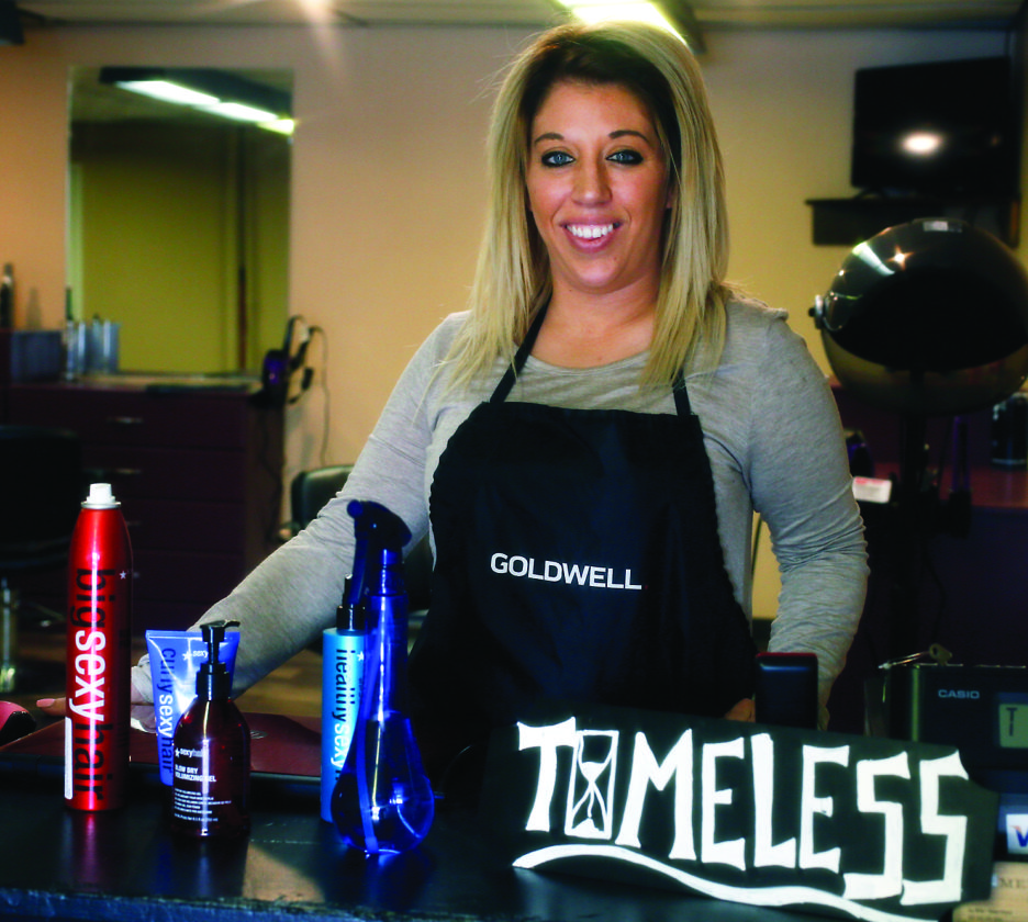 SPENCER MCCOY/FOR THE EXPRESS
Jen Miller stands with products in her new hair salon, Timeless.