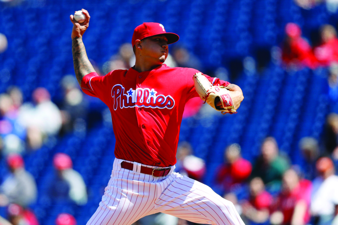 FILE - This April 14, 2016, file photo shows Philadelphia Phillies' Vince Velasquez pitching during the first inning of a baseball game against the San Diego Padres in Philadelphia. A dazzling, 16-strikeout performance was the best and worst thing that happened to Vince Velasquez last season. The hard-throwing righty quickly showed his electric stuff in his second start with the Phillies, tossing a three-hitter with no walks and 16 Ks against San Diego last April.ÊBut Velasquez spent the rest of the season trying to do it again. (AP Photo/Matt Slocum, File)