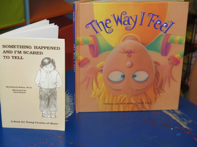 These are a few of the books available to children in the child's advocate room at the Sexual Assault Help Center. 