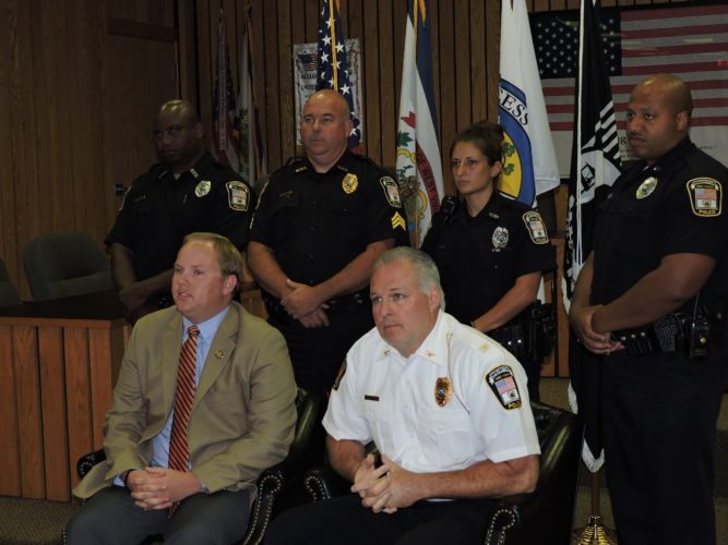 POLICE REPORTS -- On Tuesday, Weirton officials responded to a recent news report in which a former city police officer claimed he was terminated in connection to a May officer-involved shooting in the city. Officials say the former officer was terminated for conduct unbecoming an officer following a series of incidents. Taking part in a press conference at the Weirton Municipal Building were, in front from left, City Manager Travis Blosser and Police Chief Rob Alexander, and in back, Detective Gerard Spencer, Sgt. Brian Beatty, Officer Stevie Jo Banannio, and Detective Jason Turner. -- Craig Howell